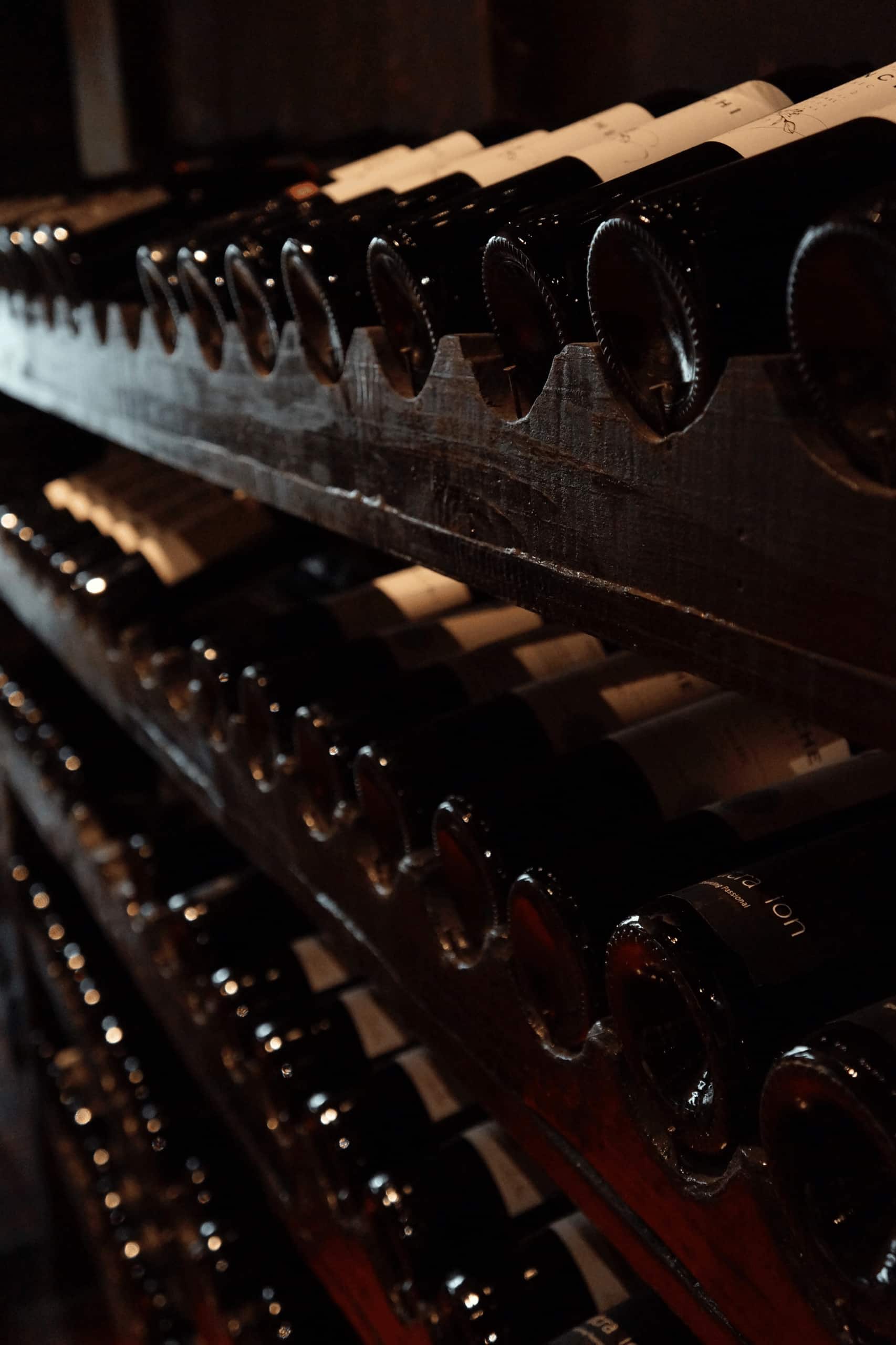Bottles of wine stored in a wine cellar